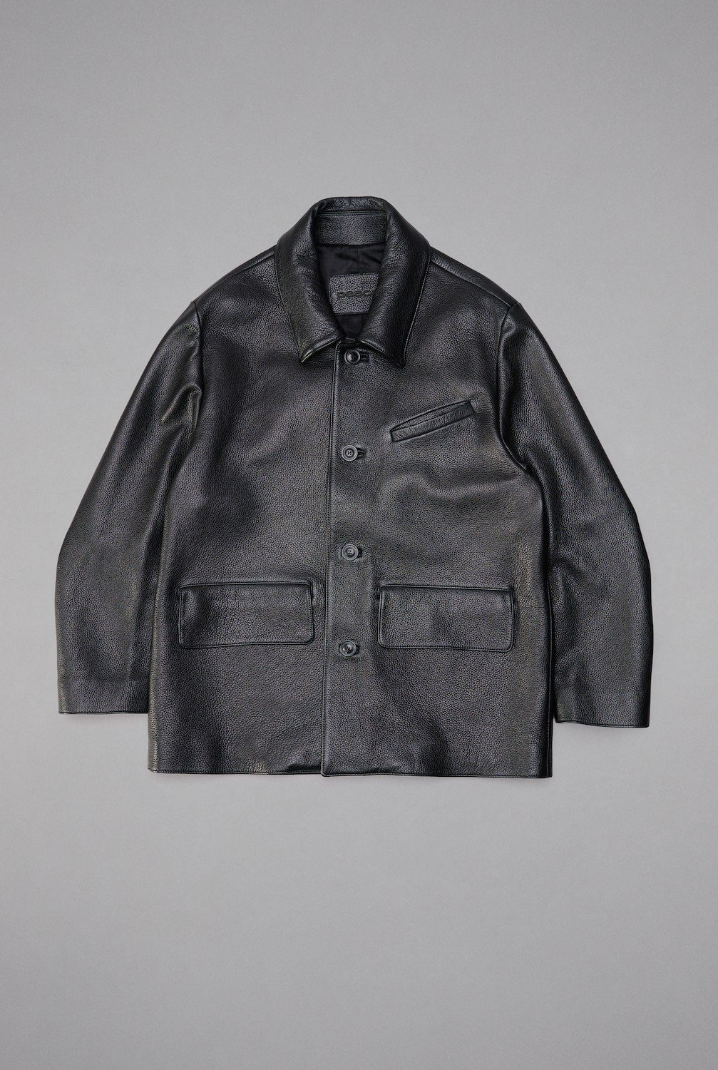 Black leather jacket flat lay photography
