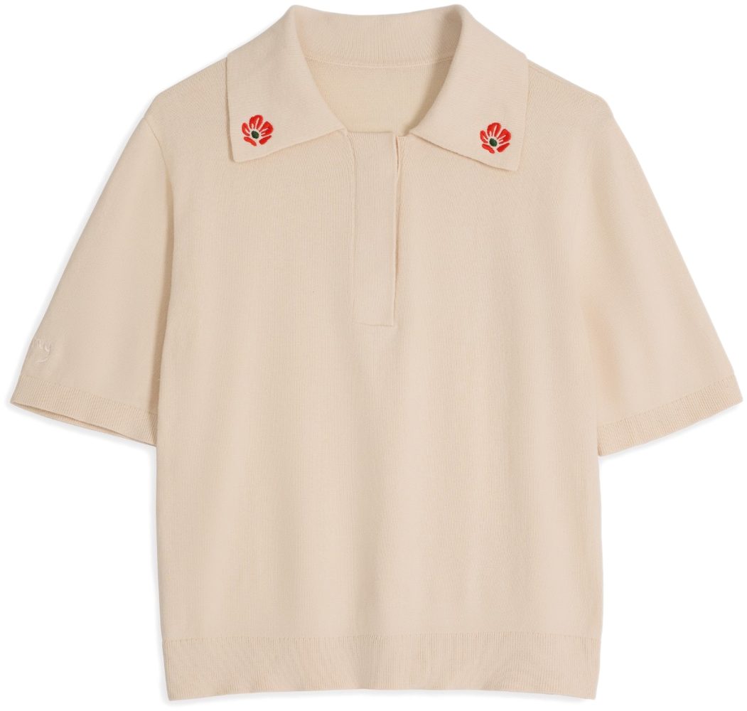 Cream floral embroidered polo shirt flat lay photography